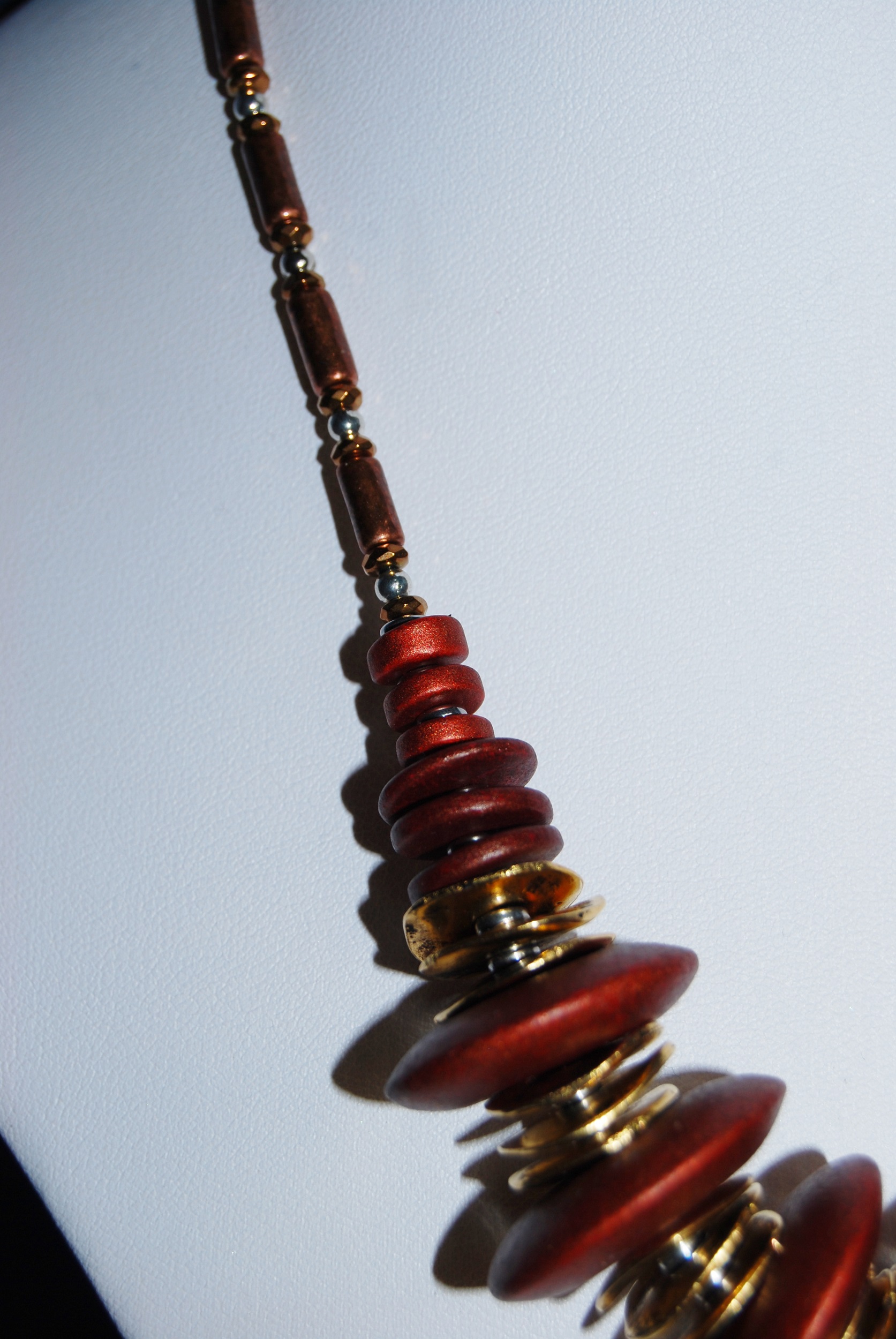On display at Percy House Gallery, Cockermouth. Unique Copper Rose Ceramic and Hammered Metal Necklace - Image 5