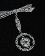 Late Victorian or Edwardian German Silver and marcasite love token pendant brooch.
