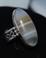 Vintage 1970's Botswanan agate and silver ring with unusual setting and celtic pattern band. Fabulous ring, so different!